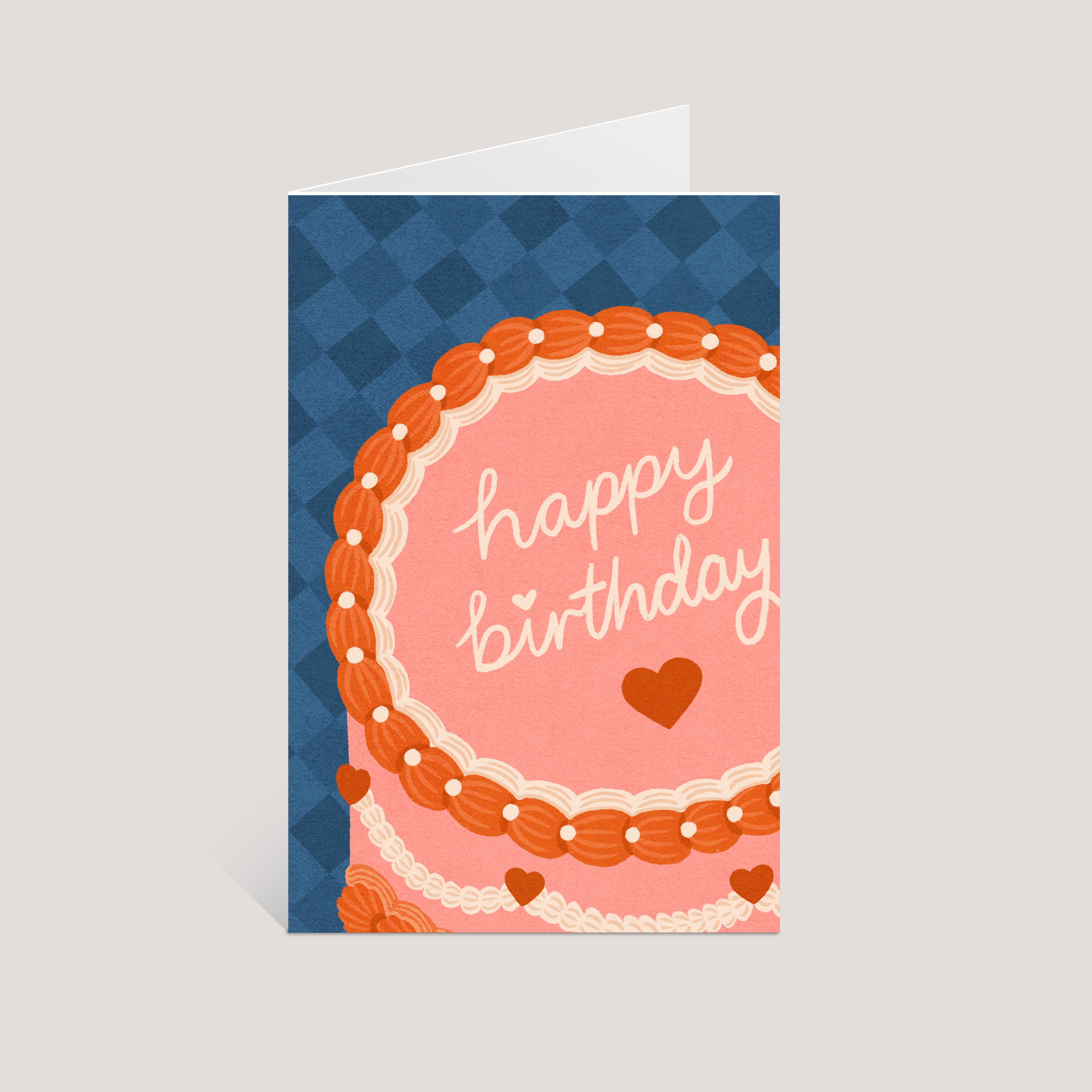Birthday card with cake design and 'happy birthday' text on a blue checkered background