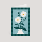 Greeting card with daisy flowers in a vase on a blue and green checkered background