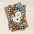 Greeting card with a dog illustration and floral pattern on a beige background