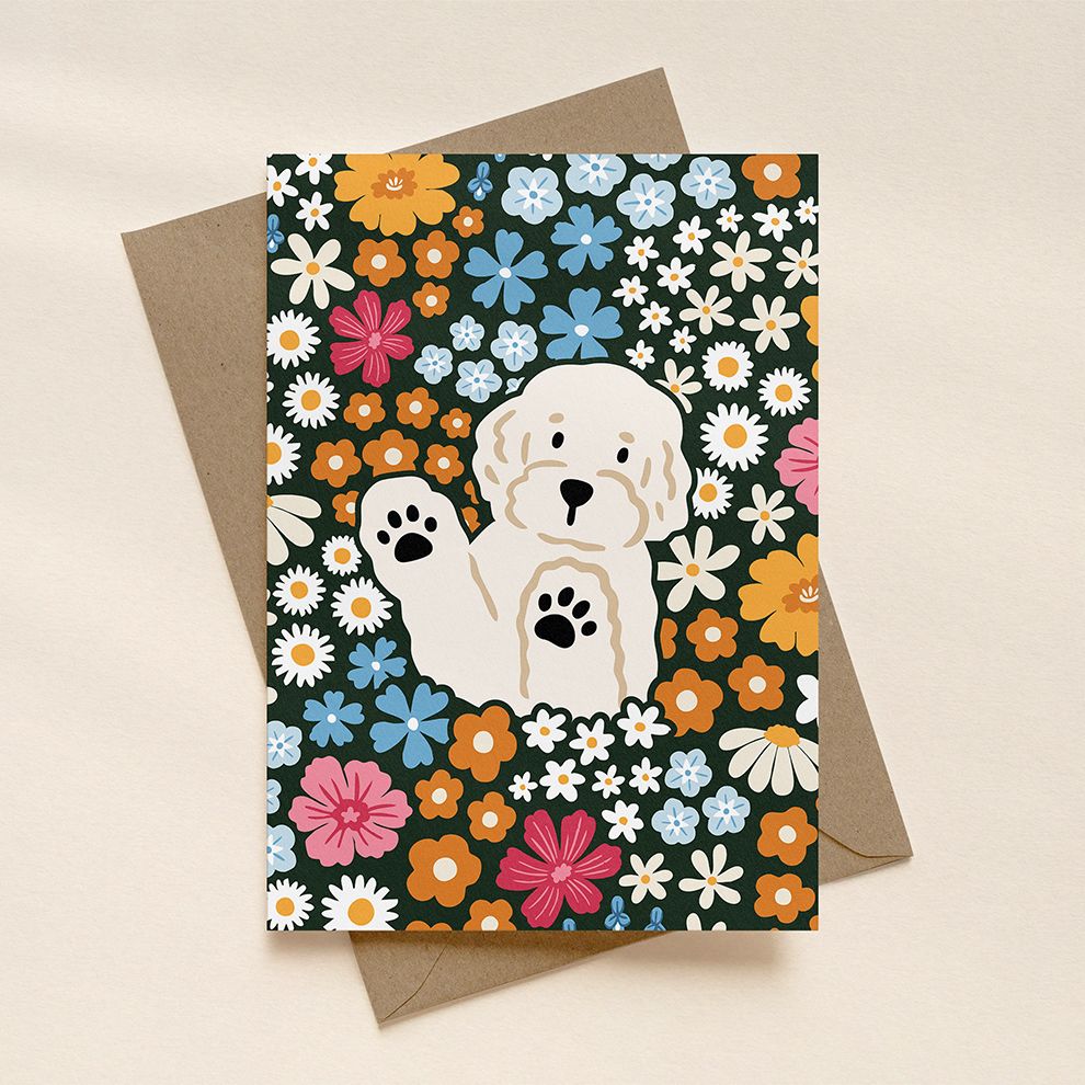 Greeting card with a dog illustration and floral pattern on a beige background