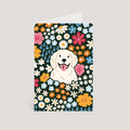 Greeting card with a dog surrounded by colorful flowers on a dark green background