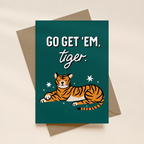 Greeting card with tiger illustration and 'Go Get 'em, tiger.' text on a beige background