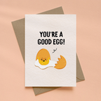 Card with cartoon egg and text 'You're a good egg!' on a beige background