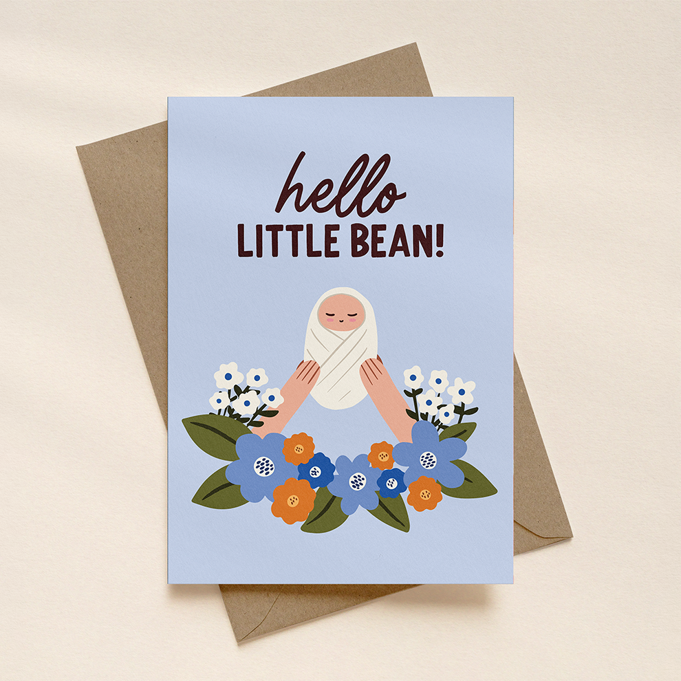Greeting card with illustration of a baby and flowers, text 'hello little bean!', on a beige background.