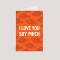 Greeting card with soy sauce fish pattern and 'I Love You Soy Much' text on an orange background