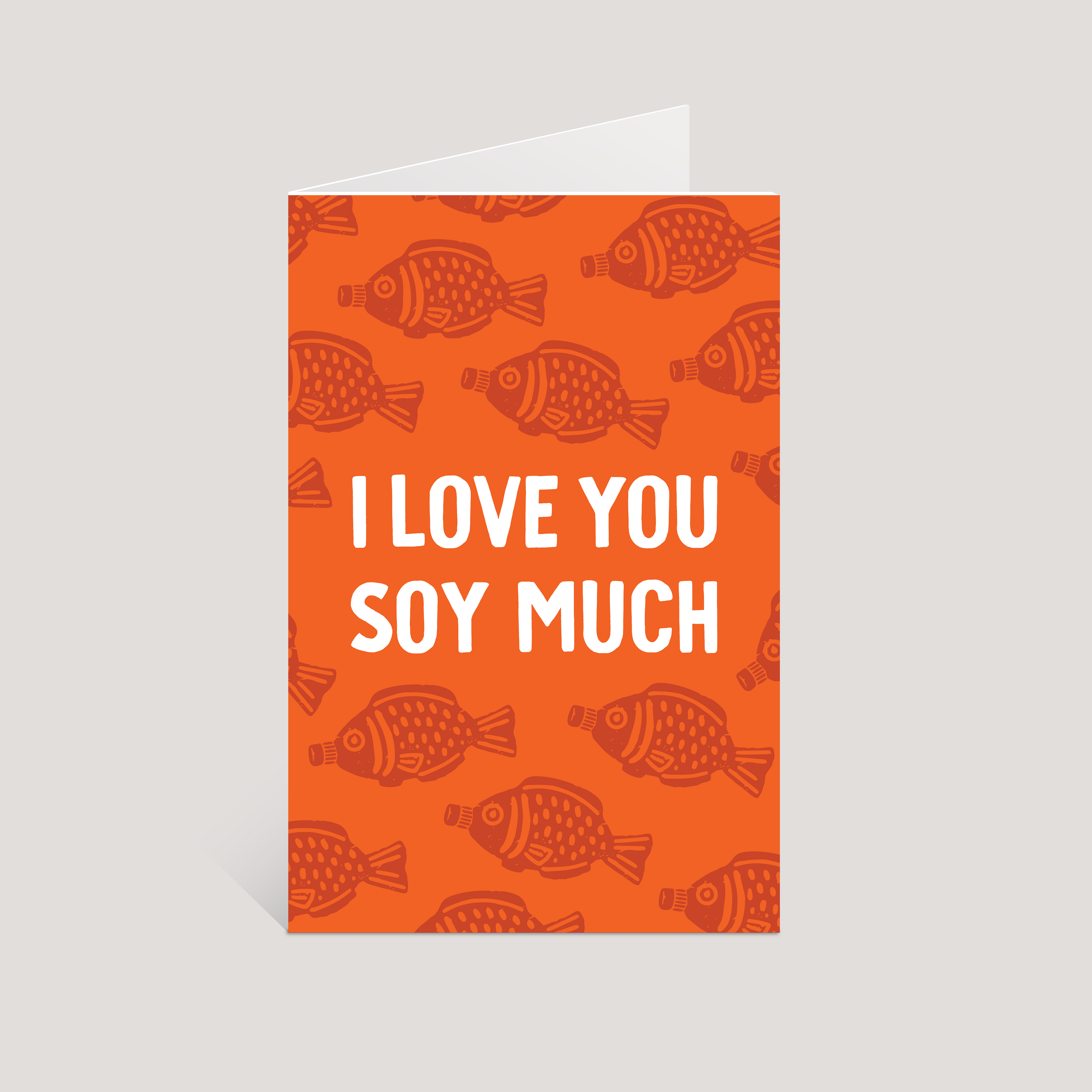 Greeting card with soy sauce fish pattern and 'I Love You Soy Much' text on an orange background