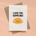 Greeting card with 'I Love You, Dumpling!' text and a dumpling illustration on a beige background.