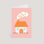 Greeting card with a house illustration and 'no place like home' text on a pink background