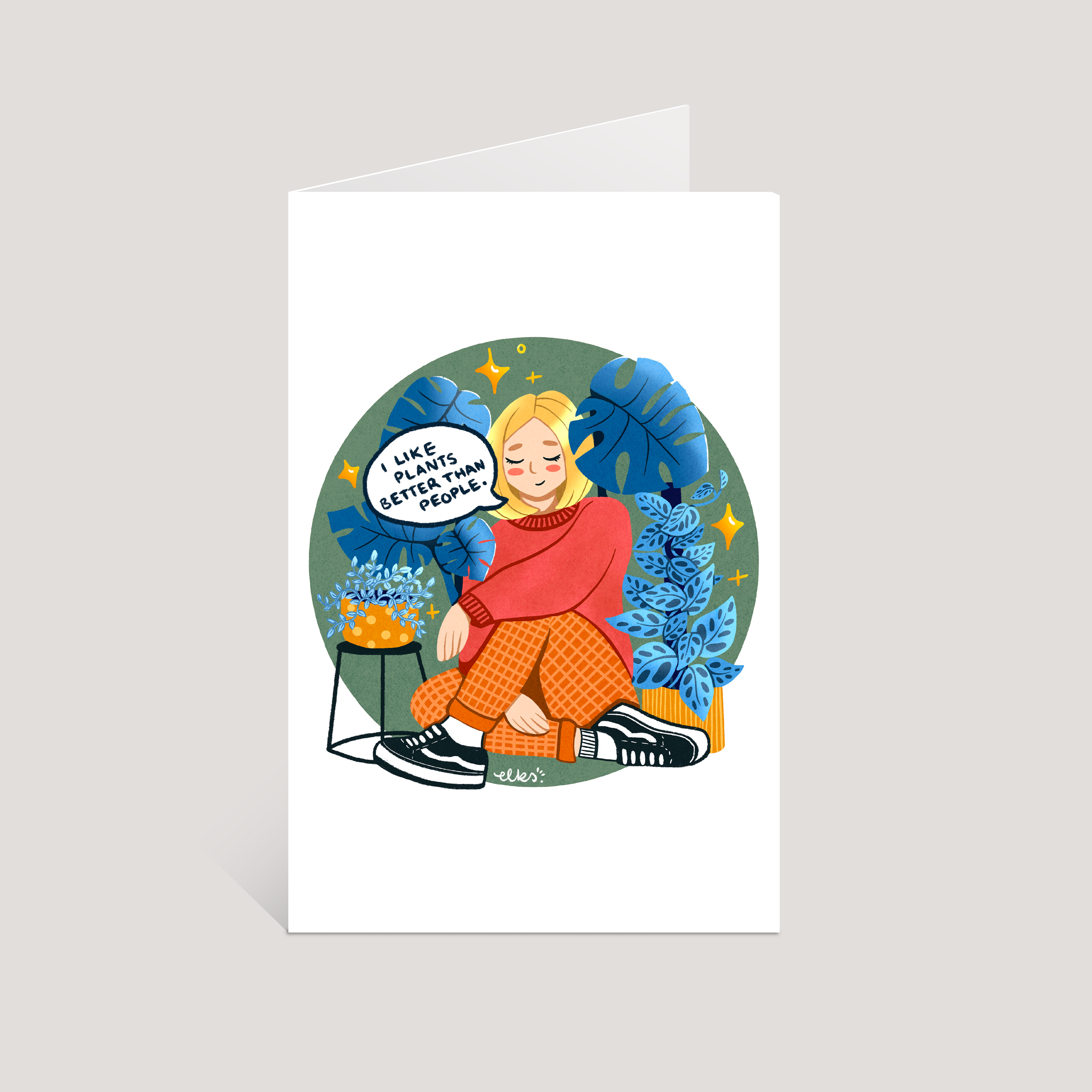 Greeting card with an illustration of a person sitting among plants, with text 'I like plants better than people'.