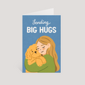 Greeting card with illustration of a woman hugging a dog and text 'Sending Big Hugs' on a blue background.