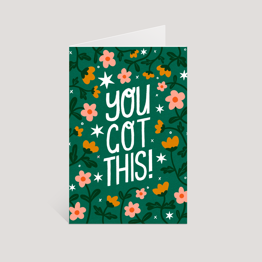 Greeting card with 'You Got This!' text and floral design on a green background